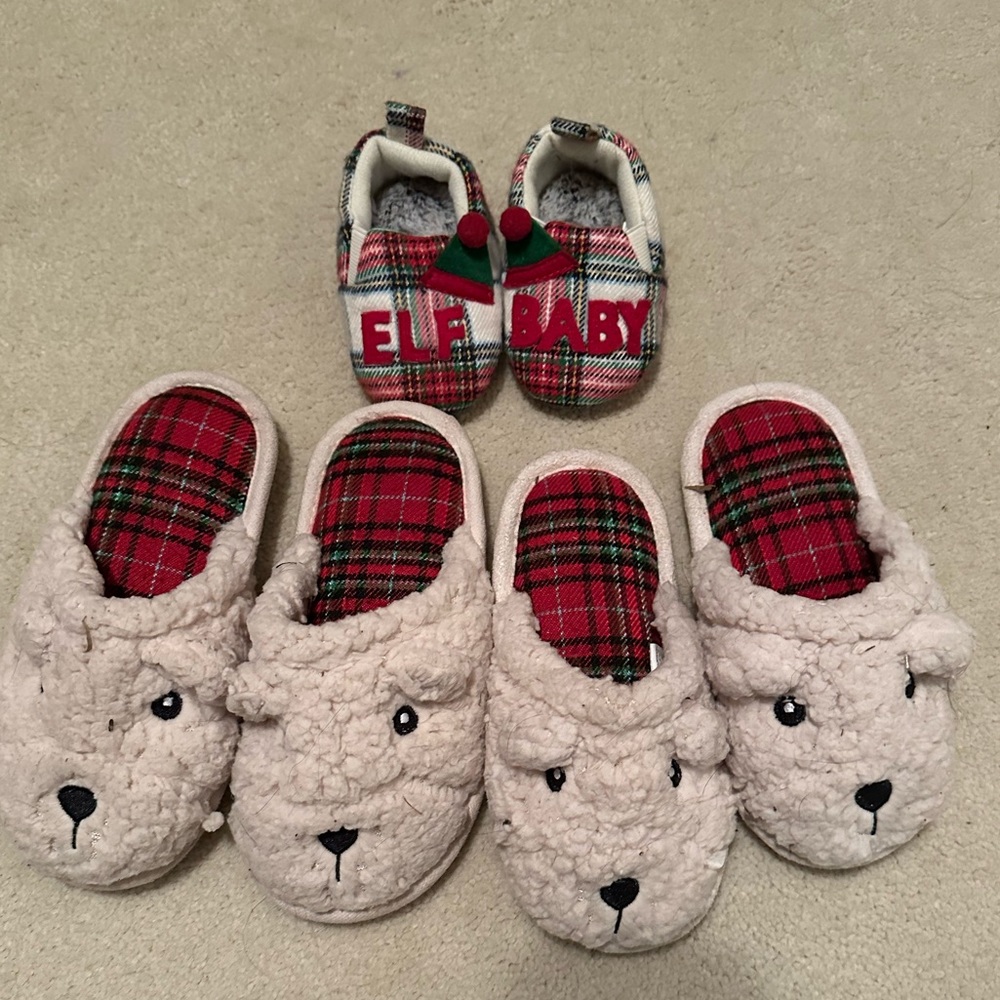 3 pairs of kids slippers. 1 baby elf slipper, 2 toddler bear slippers.